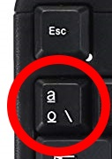 Tecla del teclado para abrir la consola (marcada en rojo)